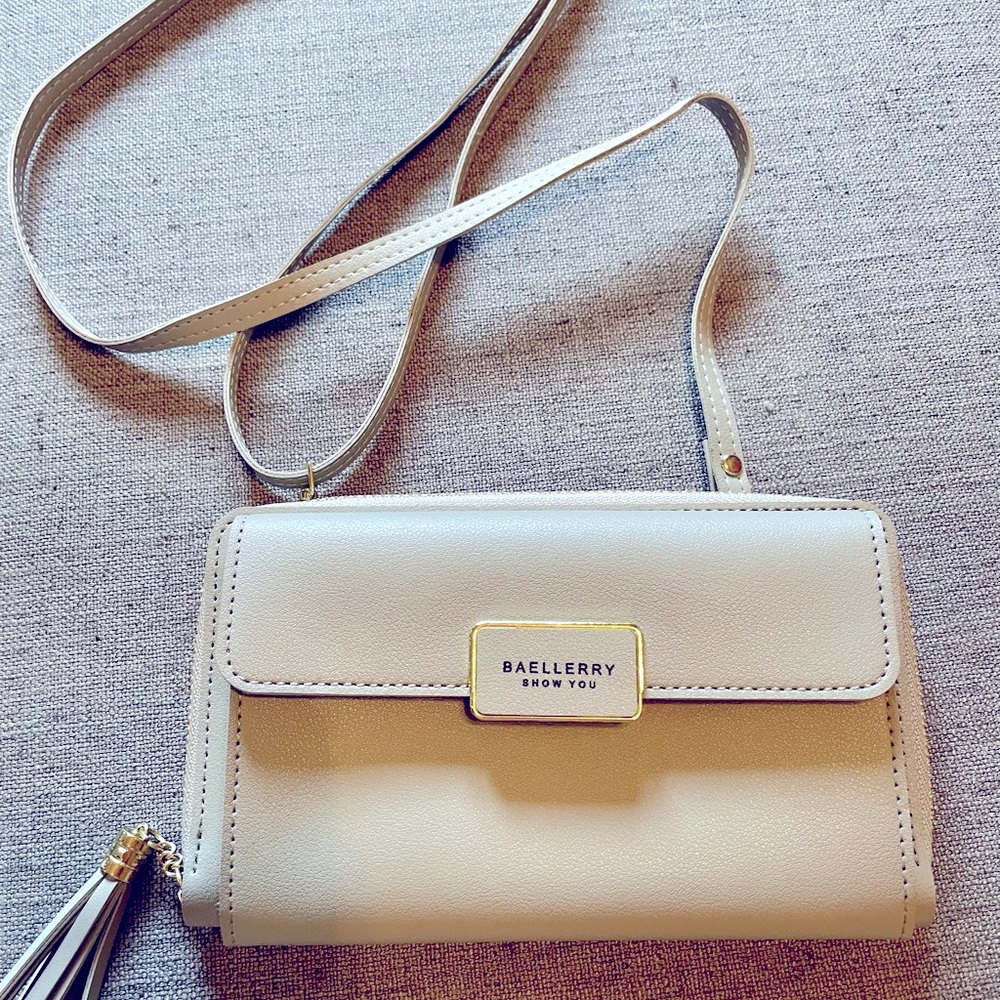 Crossbody bag.  Small size can hold a lot of cards